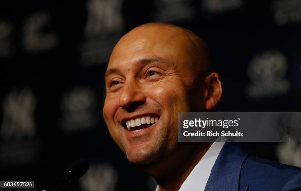 Former New York Yankees great, Derek Jeter address the media after a pregame ceremony honoring him and retiring his number 2 at Yankee Stadium on May...