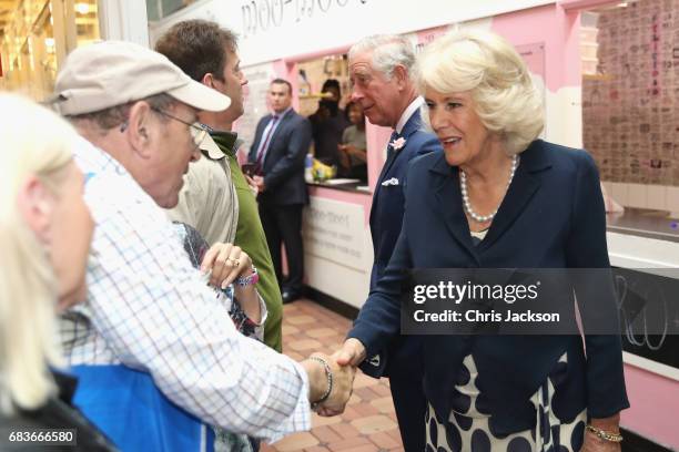 Prince Charles, Prince of Wales and Camilla, Duchess of Cornwall visit the historic Covered Market to sample produce and meet independent vendors at...