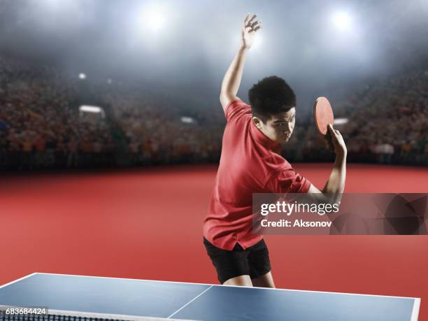 young asian ping pong player playing table tennis game - table tennis world championships stock pictures, royalty-free photos & images