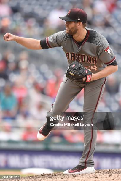 Tom Wilhelmsen of the Arizona Diamondbacks pitches during a baseball game against the Washington Nationals at Nationals Park on May 4, 2017 in...