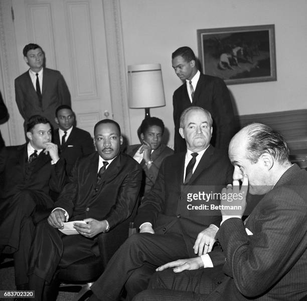 The Rev. Martin Luther King, Jr., left, meets with Vice Pres. Hubert Humphrey, center, and Attorney General-designate Nicholas deB Katzenbach in...