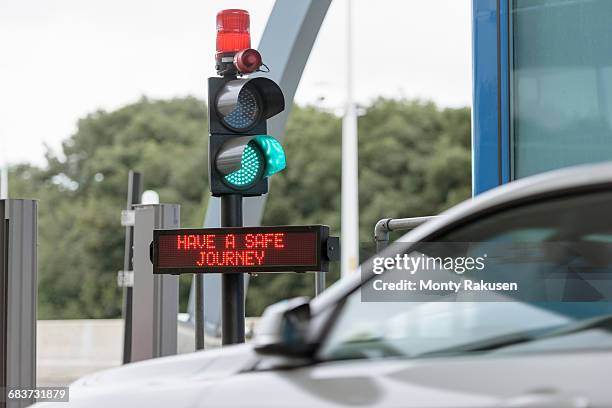 signals at toll booth at bridge toll - toll stock pictures, royalty-free photos & images