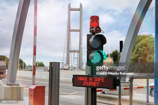 signals at toll booth at bridge toll - humber bridge stock pictures, royalty-free photos & images