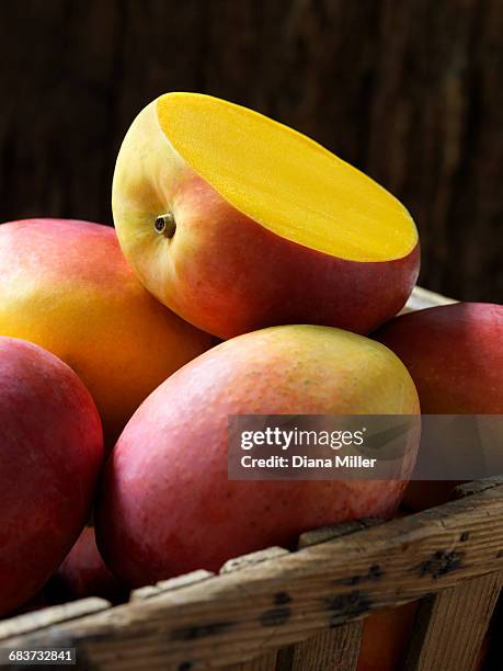 fresh organic fruit, speciality mango - mangoes stock pictures, royalty-free photos & images