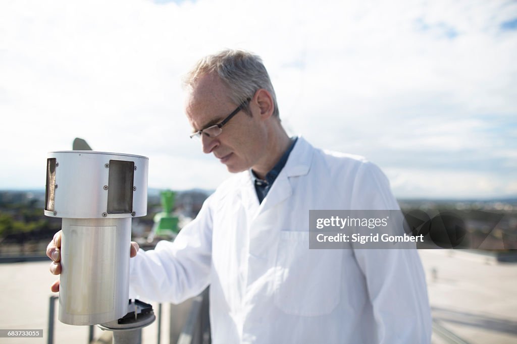 Meteorologists Male Male Meteorologist Monitoring Meteorological Equipment Measurements At ...