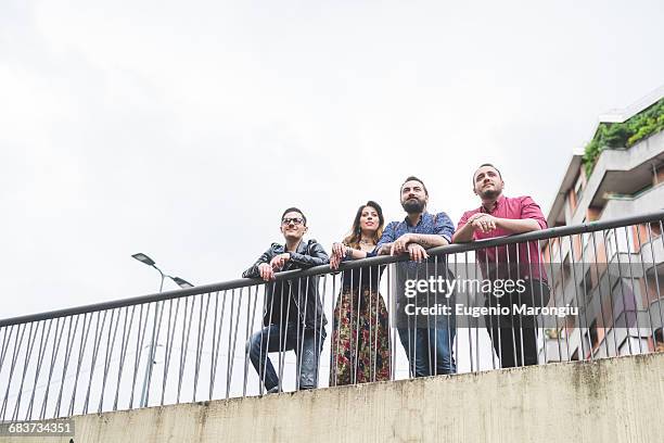 Leaning On Railing Photos and Premium High Res Pictures - Getty Images