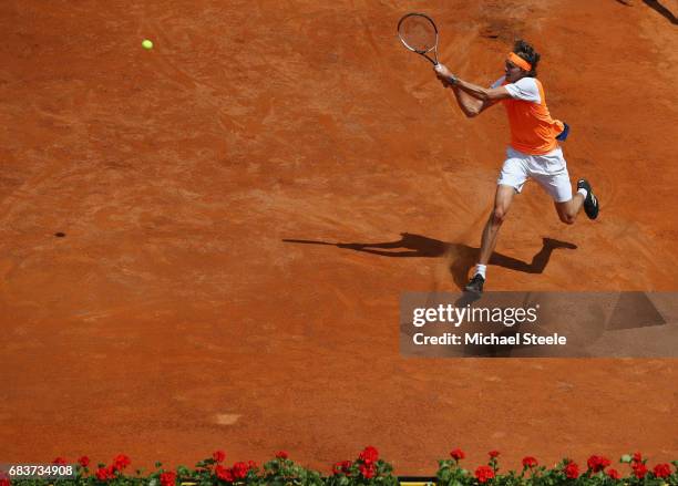 Alexander Zverev of Germany hits a return during his first round match against Kevin Andersen of South Africa on Day Three of The Internazionali BNL...