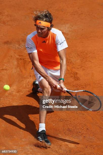 Alexander Zverev of Germany hits a return during his first round match against Kevin Andersen of South Africa on Day Three of The Internazionali BNL...