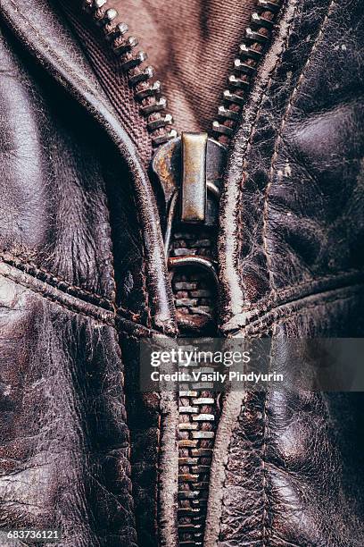full frame detail shot of leather jacket - zipper stock pictures, royalty-free photos & images