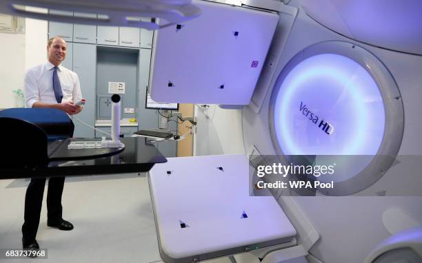 Prince William, Duke of Cambridge, is shown a Linear excelerator in the radiotherapy unit during a visit to the Royal Marsden hospital on May 16,...