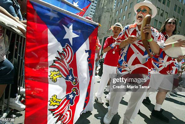 Freddy Nelez and other members of the Orgullo Caino band during the Puerto Rican Day Parade June 9, 2002 in New York City. The Puerto Rican Day...