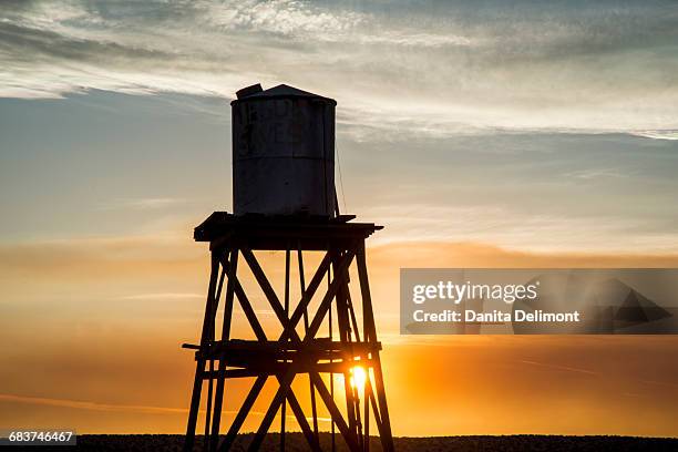 old wooden water tower at la delta during drought spotlight number 3, route 66, victorville, southern california, usa - victorville stock pictures, royalty-free photos & images
