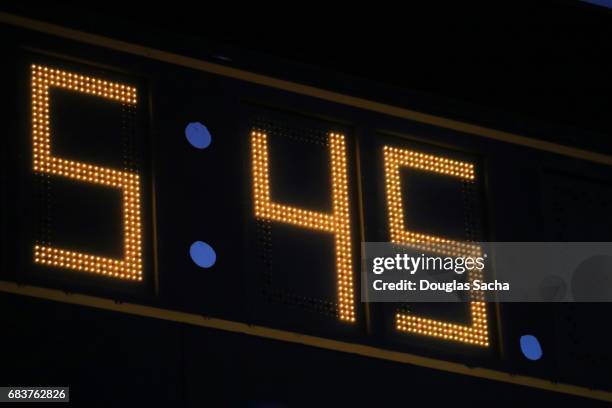 close-up of the clock on a large score board - digital clock stock pictures, royalty-free photos & images