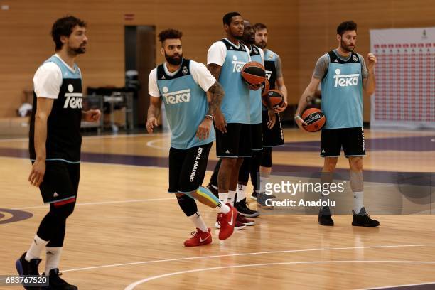 Sergio Llull , Jeffery Taylor , Trey Thompkins , Othello Hunter , Andres Nocioni and Rudy Fernandez of Real Madrid attend a training session before a...