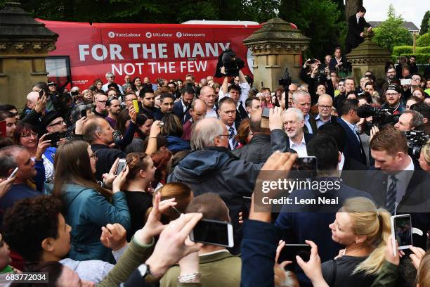 Crowd gathers round the leader of the Labour Party Jeremy Corbyn as he attends a campaign rally in Beaumont Park after launching the Labour Party...