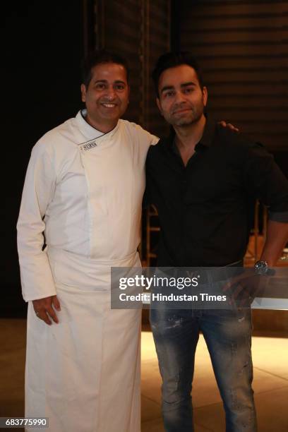 Chef Michael Swamy with Vikas Kohli, brother of Virat Kohli, during special dinner for Royal Challengers Bangalore teammates by Virat Kohli at his...