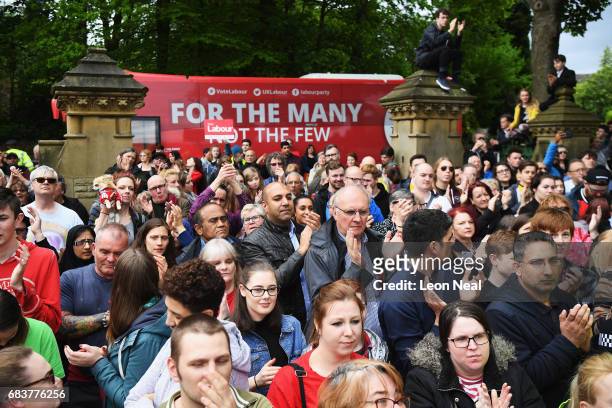 The crowd listen to leader of the Labour Party Jeremy Corbyn as he delivers a speech at a campaign rally in Beaumont Park after launching the Labour...