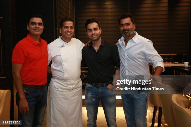 Sharad Batra, Vikas Kohli, Vikrant Batra and Chef Michael Swamy during special dinner for Royal Challengers Bangalore teammates by Virat Kohli at his...