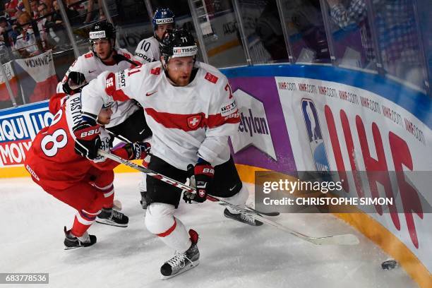 Czech Republic's forward David Pastrnak vies with Switzerland's forward Tanner Richard during the IIHF Men's World Championship group B ice hockey...