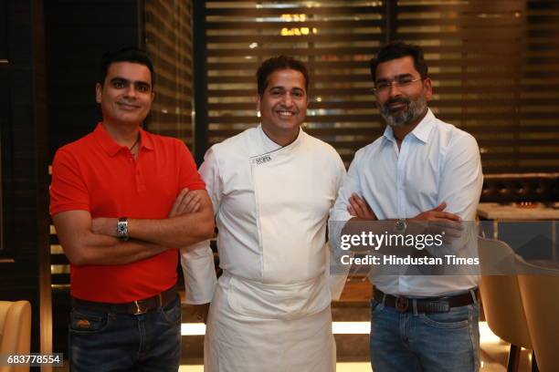 Chef Michael Swamy with Sharad and Vikrant Batra during special dinner for Royal Challengers Bangalore teammates by Virat Kohli at his new restaurant...