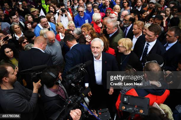 Crowd gathers round the leader of the Labour Party Jeremy Corbyn as he attends a campaign rally in Beaumont Park after launching the Labour Party...