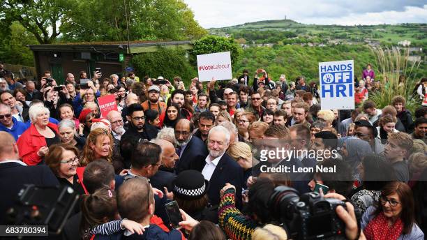 Crowd gathers round the leader of the Labour Party Jeremy Corbyn as he attends a campaign rally in Beaumont Park after launching the Labour Party...