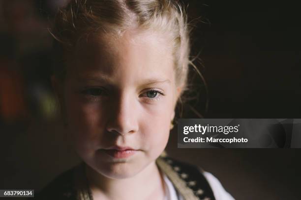 portrait of cute blond little child girl with blue eyes wearing traditional costume - actors with blonde hair and blue eyes stock pictures, royalty-free photos & images