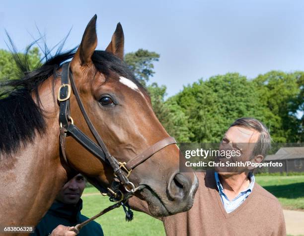 Horse racing trainer Henry Cecil with Frankel, at his stableyard in Newmarket, 2nd May 2011.