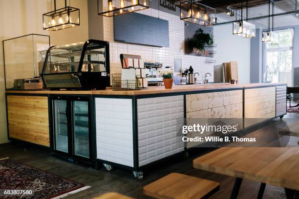 a stylish modern cafe - cafe interior stock pictures, royalty-free photos & images