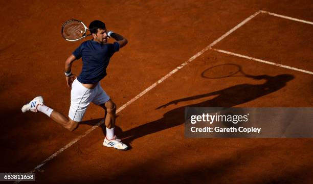 Novak Djokovic of Serbia plays a shot during his second round match against Aljaz Bedene of Great Britain in The Internazionali BNL d'Italia 2017 at...