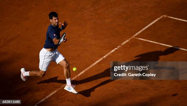 Novak Djokovic of Serbia plays a shot during his second round match against Aljaz Bedene of Great Britain in The Internazionali BNL d'Italia 2017 at...