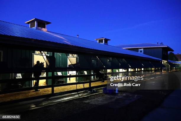 Todd Pletcher, trainer of Kentucky Derby winner Always Dreaming, walks the shed row before taking his horse out for training in the upcoming...