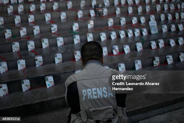 Journalists lay out the credentials of their murdered colleagues during a demonstration after the Mexican journalist Javier Valdez murder at the...