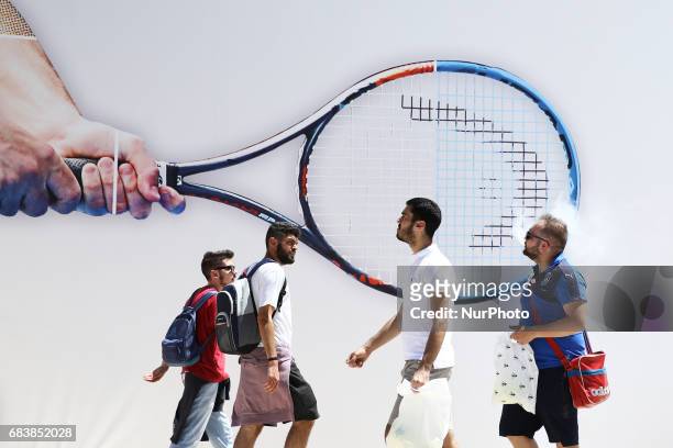 Fans under a banner with a tennis racquet at Foro Italico in Rome, Italy on May 16, 2017.