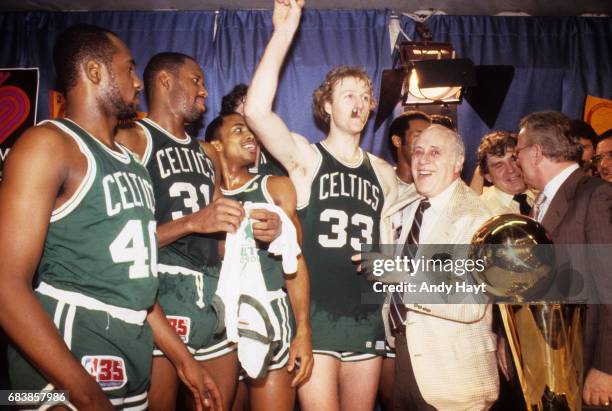 Finals: Boston Celtics Larry Bird victorious with cigar in mouth after winning game and series vs Houston Rockets at The Summit. Game 6. General...