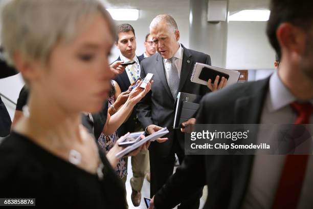 Sen. Thom Tillis is surrounded by reporters as he heads for his party's weekly policy luncheon at the U.S. Capitol May 16, 2017 in Washington, DC....