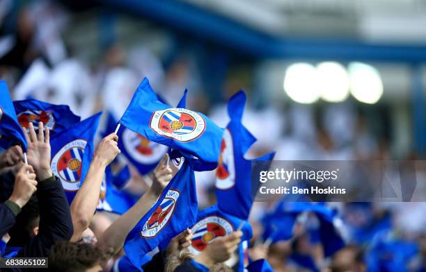 Reading fans wave flags prior to the Sky Bet Championship Play Off Second Leg match between Reading and Fulham at Madejski Stadium on May 16, 2017 in...