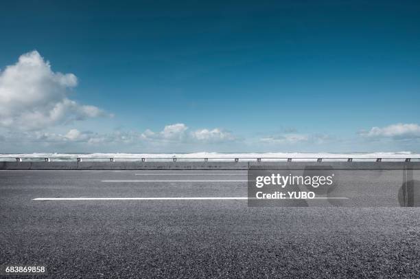 seaside road - empty road stock pictures, royalty-free photos & images