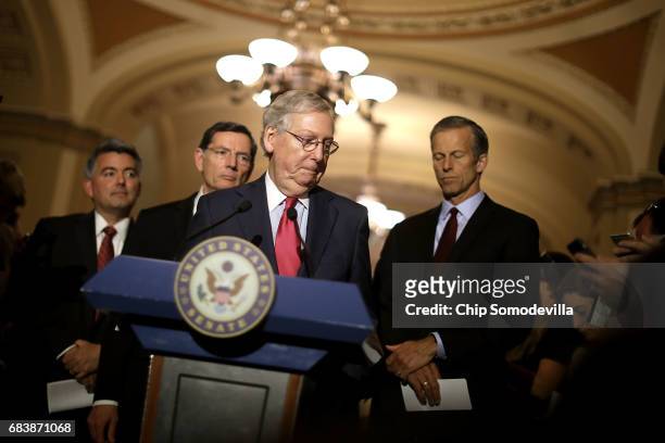 Senate Majority Leader Mitch McConnell talks to reporters with Sen. Cory Gardner , Sen. John Barrosso and Sen. John Thune following their party's...