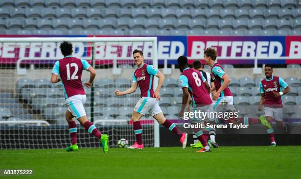 Toni Martinez of West Ham celebrates with teammates after scoring West Ham's second goal during the Premier League 2 Play-Off Match between Newcastle...