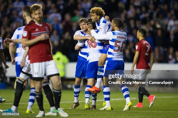Reading's Yann Kermorgant celebrates scoring the opening goal with team mates during the Sky Bet Championship Play-Off Semi Final Second Leg match...