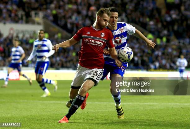 Tomas Kalas of Fulham handles the ball in the penalty area while under pressure from Yann Kermorgant of Reading and a peanlty is later awarded to...