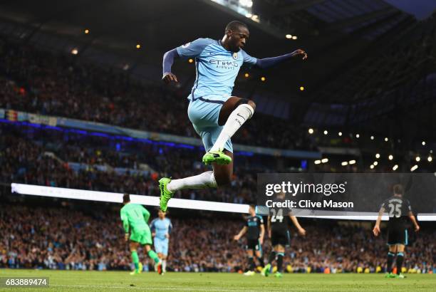 Yaya Toure of Manchester City celebrates scoring his sides third goal during the Premier League match between Manchester City and West Bromwich...