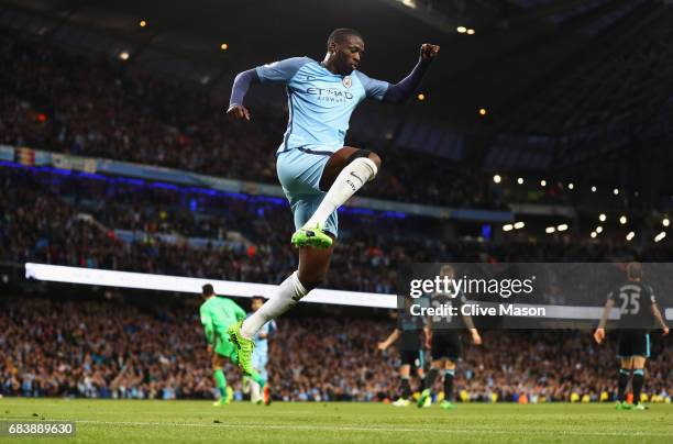 Yaya Toure of Manchester City celebrates scoring his sides third goal during the Premier League match between Manchester City and West Bromwich...
