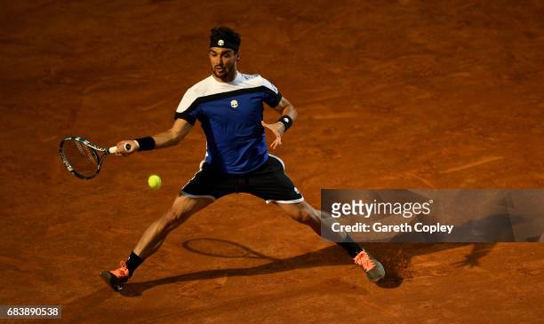 Fabio Fognini of Italy plays a shot during his second round match against Andy Murray of Great Britain in The Internazionali BNL d'Italia 2017 at...