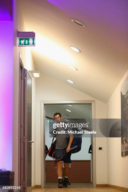 Andy Murray of Great Britain heads towards centre court ahead of his second round match against Fabio Fognini of Italy on Day Three of The...