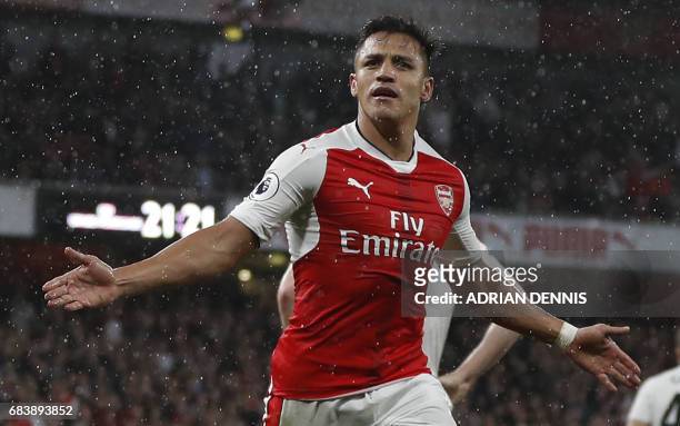 Arsenal's Chilean striker Alexis Sanchez celebrates scoring the second goal during the English Premier League football match between Arsenal and...