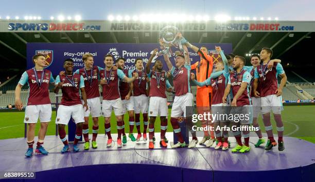 Declan Rice of West Ham United lifts the trophy following the Premier League 2 Play Off Final between Newcastle United and West Ham United at St....