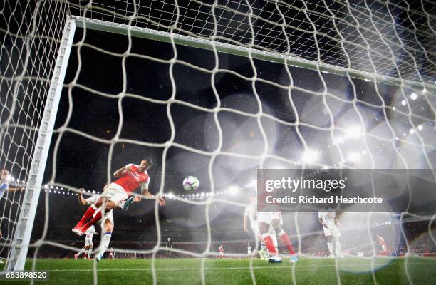 Alexis Sanchez of Arsenal scores his sides second goal during the Premier League match between Arsenal and Sunderland at Emirates Stadium on May 16,...