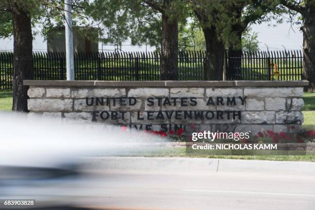Sign marks the entrance to US Army facility Fort Leavenworth in Leavenworth, Kansas, on May 16, 2017. After seven years behind bars, US Army Private...
